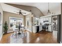 Kitchen area featuring stainless appliances, a breakfast nook and hardwood floors at 2006 Hawthorne Way, Woodstock, GA 30189