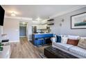 Cozy living room with comfortable seating, modern decor, and stylish furnishings near updated kitchen at 275 13Th St # Apt 509, Atlanta, GA 30309
