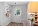 Mud room or entryway with wood floors and decor at 651 Egrets Landing #53, Covington, GA 30014