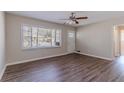 Bright living room with wood-look floors, neutral walls, and natural light at 2777 Luther Dr, Atlanta, GA 30344