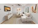 Bright living room with a neutral palette, modern furnishings, and abundant natural light at 578 Center Hill Nw Ave, Atlanta, GA 30318