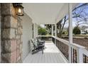 Inviting front porch with stone details, classic chairs, and views of the neighborhood at 1916 Cannon St, Decatur, GA 30032