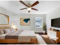 Serene main bedroom featuring hardwood floors, neutral paint, and a cozy ambiance at 6296 Flamingo Way, Morrow, GA 30260