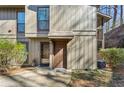 Condo entrance showcasing two front doors with painted exteriors and manicured landscaping at 2701 Cumberland Se Ct, Smyrna, GA 30080