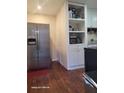 Functional kitchen design featuring stainless steel appliances and laminate wood flooring at 2335 Boulder Se Rd, Atlanta, GA 30316