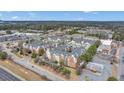 Aerial view of a multi-building apartment complex nestled in a lush, green landscape at 1850 Cotillion Dr # 3305, Atlanta, GA 30338