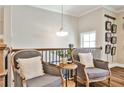 Cozy sitting area with comfortable armchairs, accent pillows, and decorative wall hangings at 429 Stagecoach Bnd, Smyrna, GA 30080