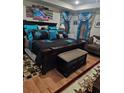 Bedroom with stylish decorations and a comfortable bed with unique throw pillows at 2761 Trebek Ct, Mcdonough, GA 30253