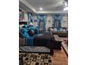 Bedroom with stylish decorations and a comfortable bed with unique throw pillows at 2761 Trebek Ct, Mcdonough, GA 30253