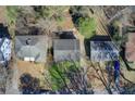 Aerial view of neighborhood with manicured lawns and mature trees at 1834 Buckeye Sw St, Atlanta, GA 30310