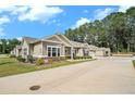 Inviting view of single-story homes featuring neutral siding, well-maintained lawns, and long driveways at 3901 Shelleydale Dr, Powder Springs, GA 30127