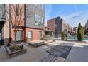 Modern brick townhome and community pool, showcasing the property's exterior features at 1226 Chelsea Nw Cir, Atlanta, GA 30318