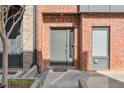 Modern brick townhome entrance, showcasing the property's front door and entryway at 1226 Chelsea Nw Cir, Atlanta, GA 30318