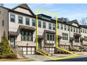 Attractive row of townhomes showcasing modern architectural details and well-maintained landscaping at 2353 Medlock Ln, Decatur, GA 30033