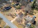 Aerial shot showcasing the home's location within a quiet residential neighborhood at 303 Wood Wind Dr, Woodstock, GA 30189