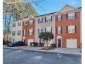 Attractive townhomes offer comfortable living with one-car garages and well-maintained surroundings at 5362 Hickory Nw Knl, Norcross, GA 30071