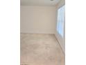 Bright bedroom with a large window offering plenty of natural light at 2969 Wynhaven Oaks Way, Lawrenceville, GA 30042