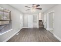 Bright and airy living room with wood flooring and a staircase at 2653 Del Ridge Dr, Douglasville, GA 30135
