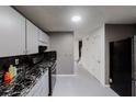 Spacious kitchen boasts modern appliances, ample cabinet space, and a convenient layout for cooking at 3068 River Oak Rd, Decatur, GA 30034