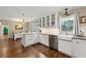 Bright kitchen featuring white cabinetry, stainless steel appliances, and modern countertops at 1147 Longshore Dr, Decatur, GA 30032