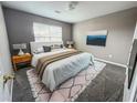 Bedroom featuring neutral decor, a comfortable bed, and simple furnishings at 4369 Estate St, South Fulton, GA 30349