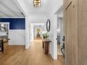 Elegant foyer with hardwood floors and a view into the open-concept living spaces at 231 Sisson Ne Ave, Atlanta, GA 30317