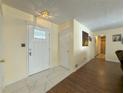 Bright foyer featuring ceramic tile and wood floors, leading to other rooms in this lovely home at 2056 Merle Se Dr, Conyers, GA 30013