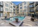 Inviting community pool area with lounge chairs and well-maintained surroundings at 5300 Peachtree Rd # 3507, Chamblee, GA 30341