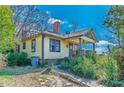 Side view of a bungalow showing architectural details and small chimney at 3630 Union Ave, Hapeville, GA 30354