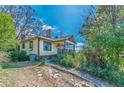 Side view of a bungalow showing architectural details and small chimney at 3630 Union Ave, Hapeville, GA 30354