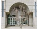 Modern building entrance featuring a unique arched design at 361 17Th Nw St # 2423, Atlanta, GA 30363