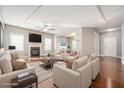 Spacious living room featuring a fireplace, hardwood floors, and neutral color scheme at 3272 Tiara Sw Cir, Atlanta, GA 30311