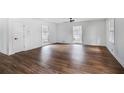 Spacious living room featuring hardwood floors, neutral walls, and natural lighting at 3280 Hazelwood Sw Dr, Atlanta, GA 30311