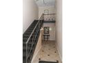 Entry hall featuring an elegant stairway with patterned carpeting and stylish decor at 115 Biscayne Dr # C2, Atlanta, GA 30309