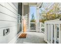 Welcoming front porch with 'hello fall' mat and seasonal décor; a lovely entrance to the home at 2845 Jims Ne Rd, Marietta, GA 30066