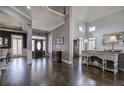 Grand foyer with gleaming hardwood floors, high ceilings, and elegant decor, creating an inviting entrance at 3759 Maryhill Nw Ln, Kennesaw, GA 30152