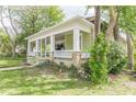 Covered porch with brick pillars and white trim that creates a welcoming outdoor space at 3670 Union Ave, Atlanta, GA 30354