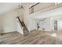 Bright living room showcasing a chandelier, staircase, and an open floor plan at 1069 Falling Water Se Dr, Smyrna, GA 30080