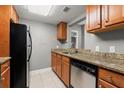 Kitchen features granite countertops and stainless steel appliances at 1280 W Peachtree Nw St # 3303, Atlanta, GA 30309