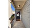 Charming front porch welcomes you with a decorative wreath and a 'Welcome' sign at 156 Auburn Crossing Dr, Auburn, GA 30011