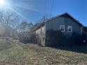 View of the house from backyard, showing a deck at 57 Haven Ridge Dr, Carrollton, GA 30116