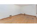 Empty room featuring hardwood floors and white walls at 3951 Lindley Dr, Powder Springs, GA 30127