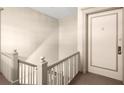 Hallway staircase leading to unit with neutral colors and traditional design at 746 N Highland Ne Ave # 11, Atlanta, GA 30306