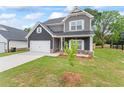 Charming home with a spacious lawn, perfect for outdoor activities and curb appeal at 11204 Cornerstone Way, Hampton, GA 30228