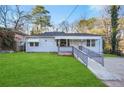 Charming single story home with a well-maintained front yard and inviting walkway at 391 Mount Zion Sw Rd, Atlanta, GA 30354