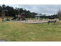 Community playground with swings, slides, and ample seating for families to enjoy at 5320 Tolar Rd, South Fulton, GA 30213