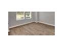 The bedroom features modern finishes, neutral paint, and lots of natural light at 5324 Tolar Rd, South Fulton, GA 30213