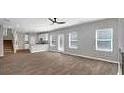 Open living area with abundant natural light, neutral walls, and hardwood floors at 5324 Tolar Rd, South Fulton, GA 30213