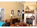 Bright living room with fireplace, wood floors, and a warm, inviting ambiance at 1358 Apple Orchard Ln, Snellville, GA 30078