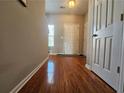 Welcoming foyer with hardwood floors and natural light at 3835 Pleasant Oaks Dr, Lawrenceville, GA 30044